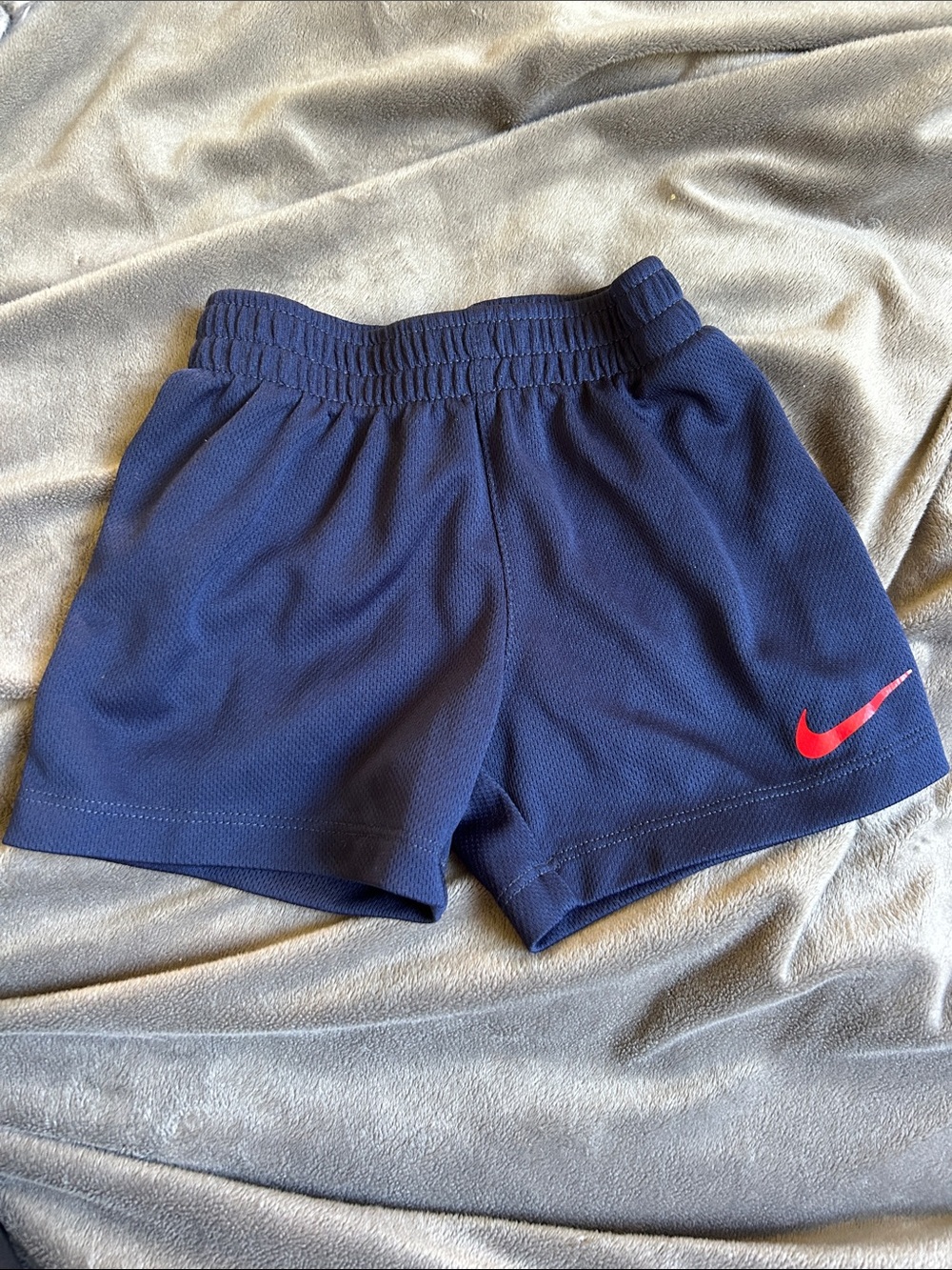 Nike Navy Kids Athletic Shorts with Red Swoosh
